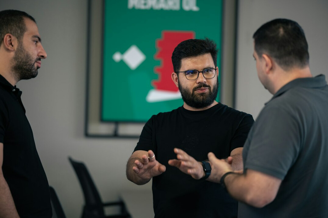 group of programmers discussing