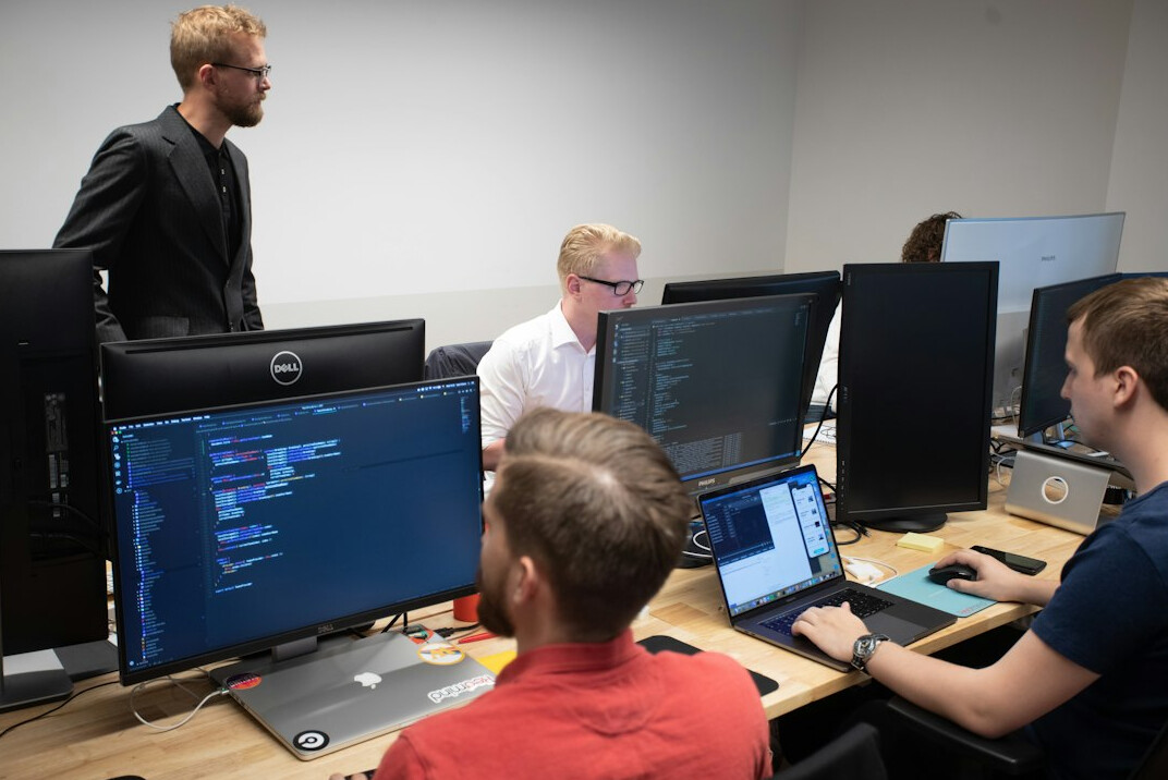 adult students in coding class