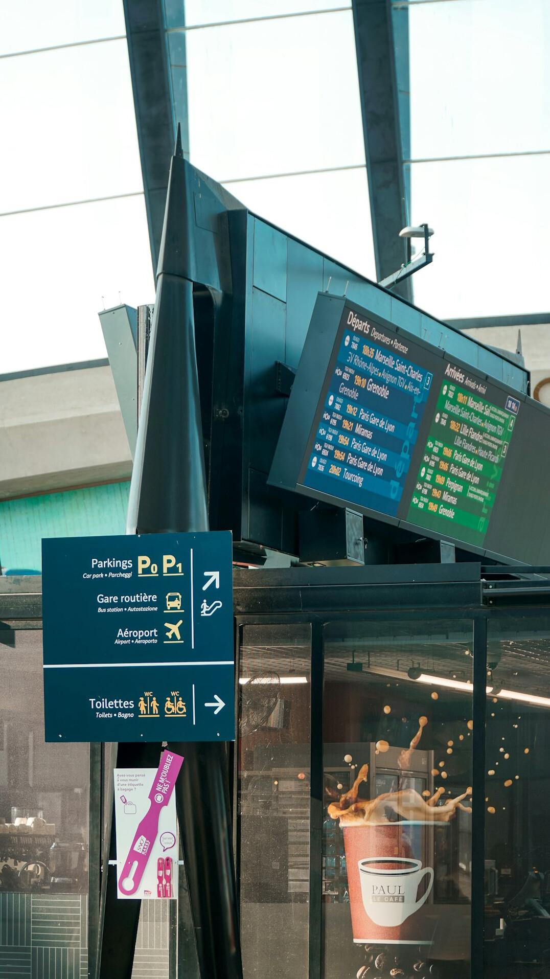 Two monitors displaying programming code side by side