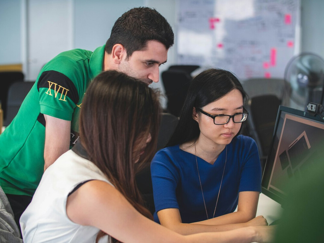 team discussing code